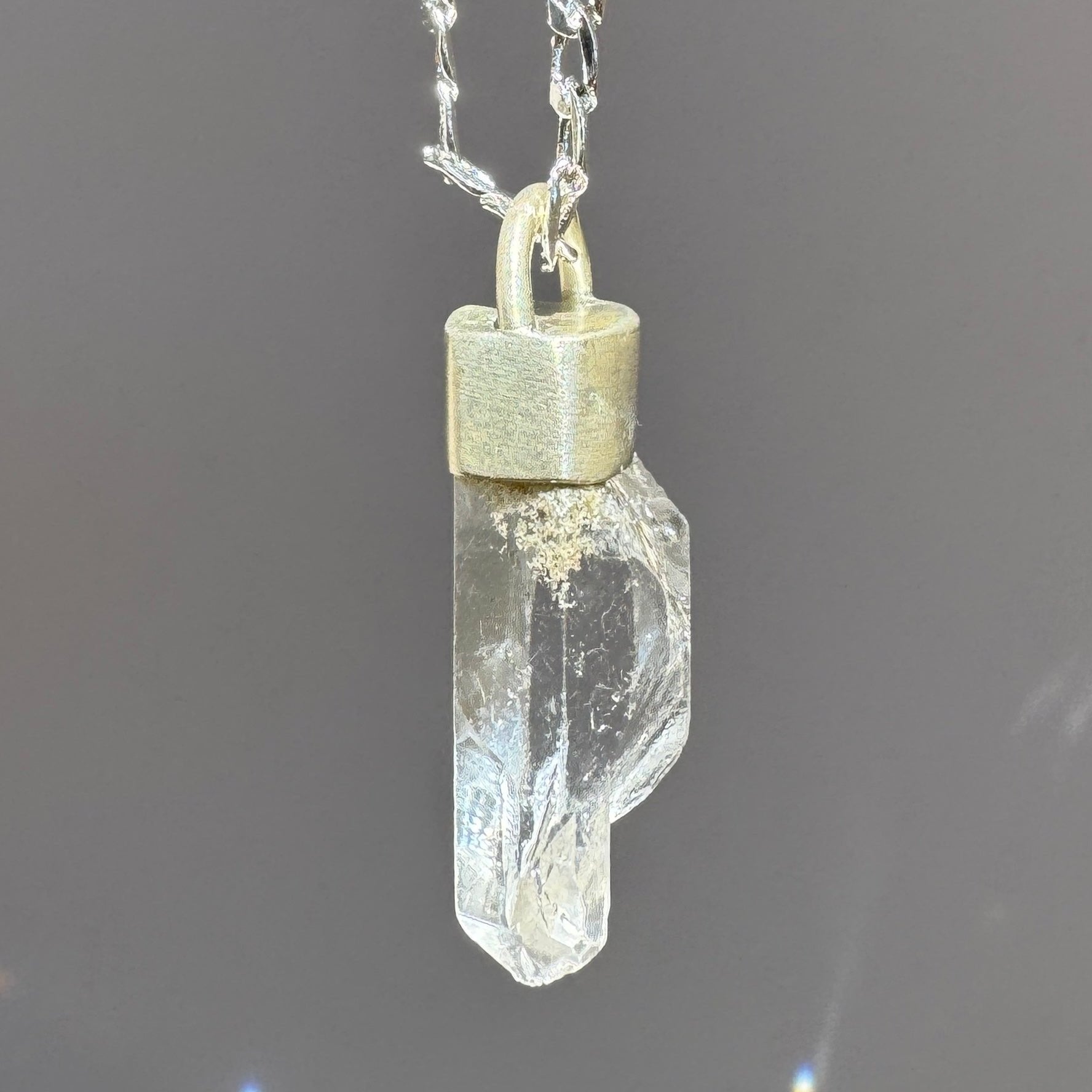 Raw uncut clear quartz talisman pendant necklace on sterling silver base