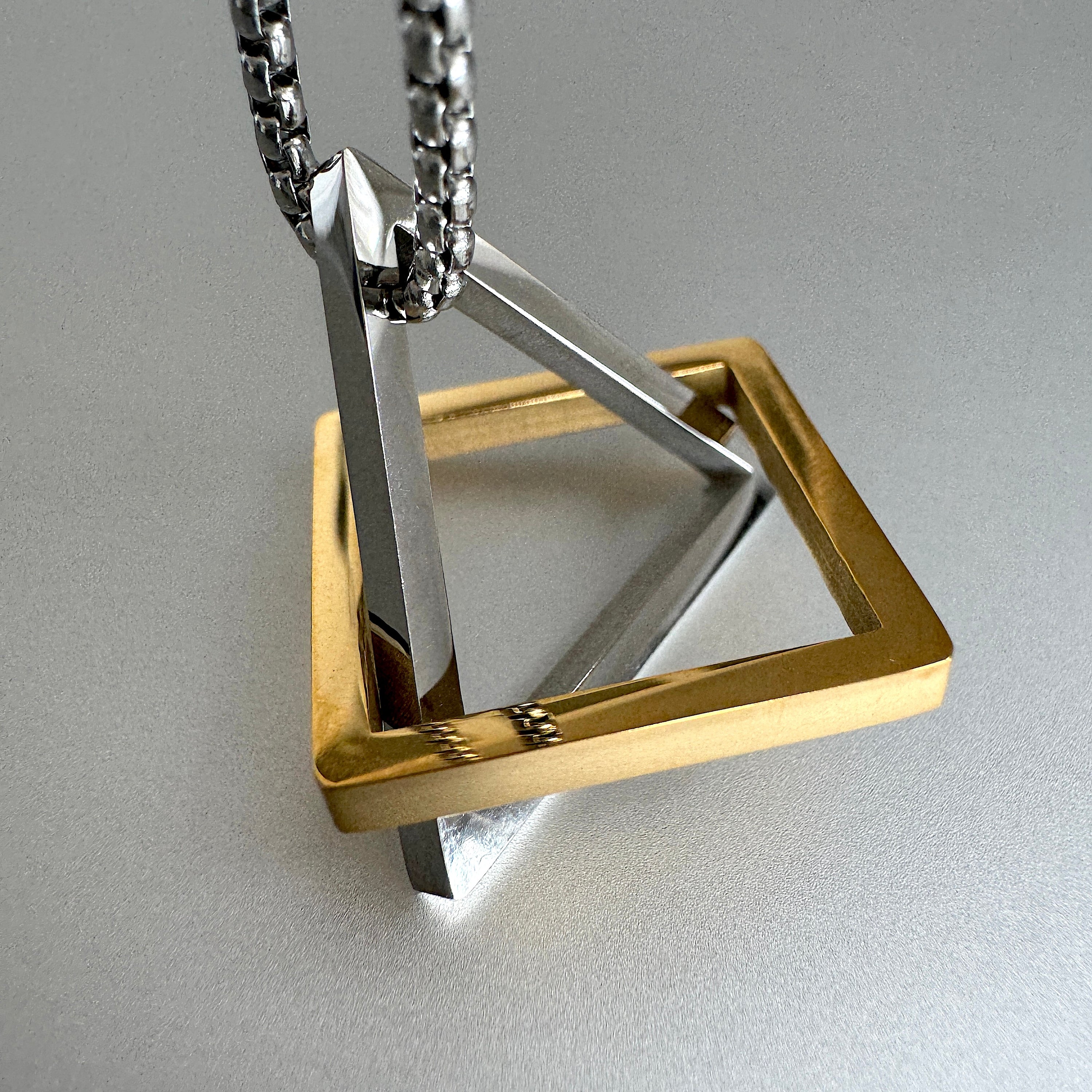 Geometric Interlocking Triangle Square Pendant