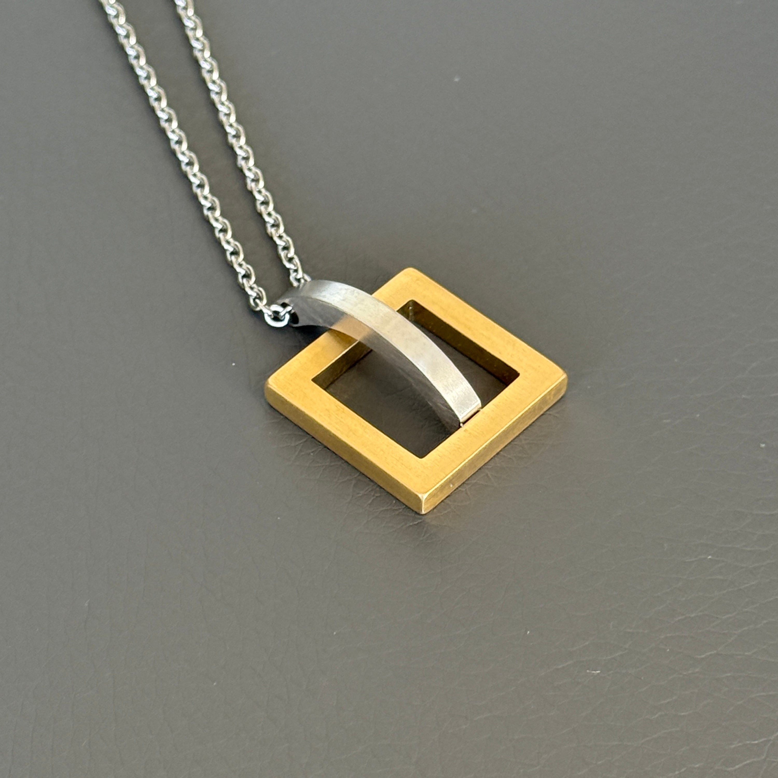 Gold Square with Silver Arc Geometric Pendant