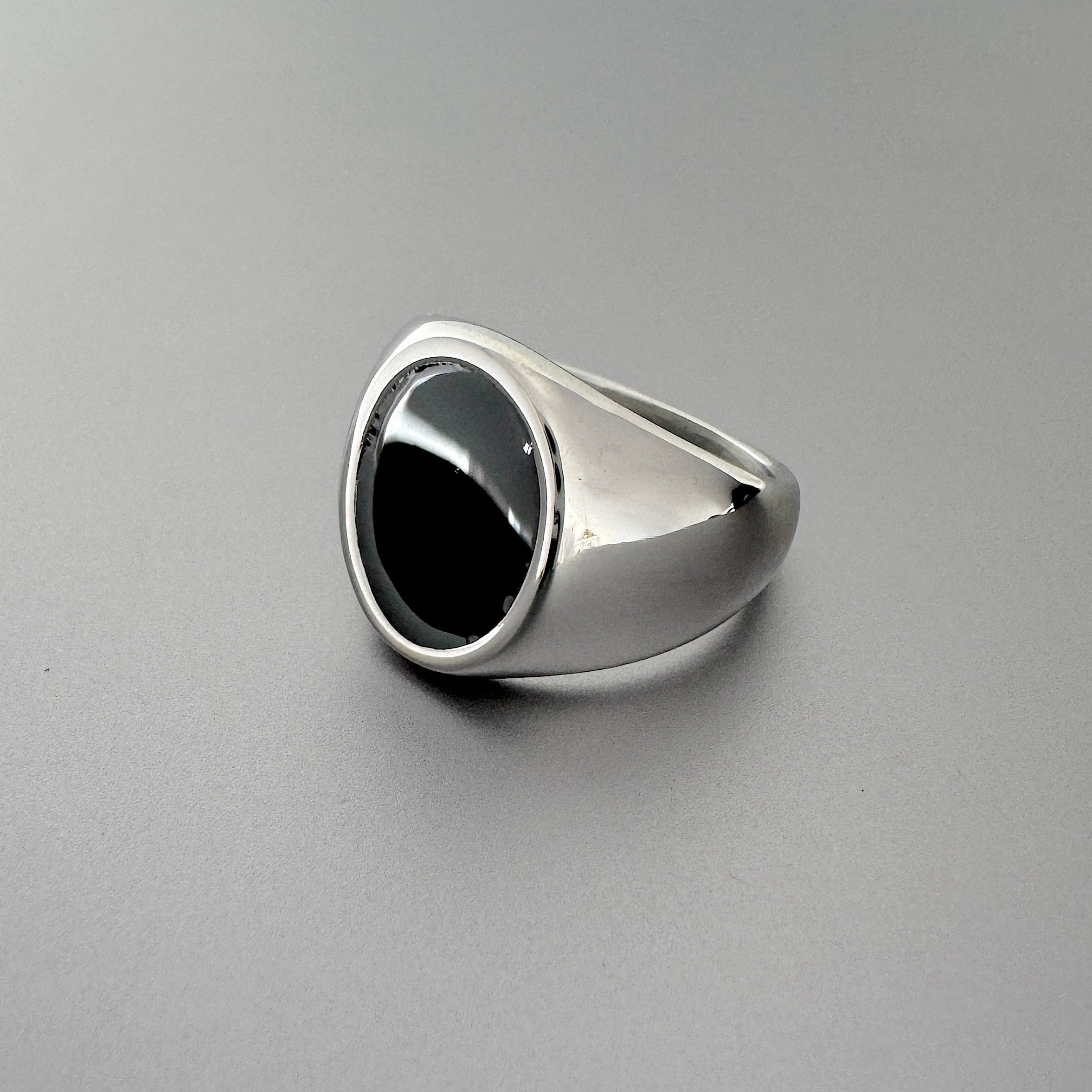 mens black oval signet pinky ring with polished silver band