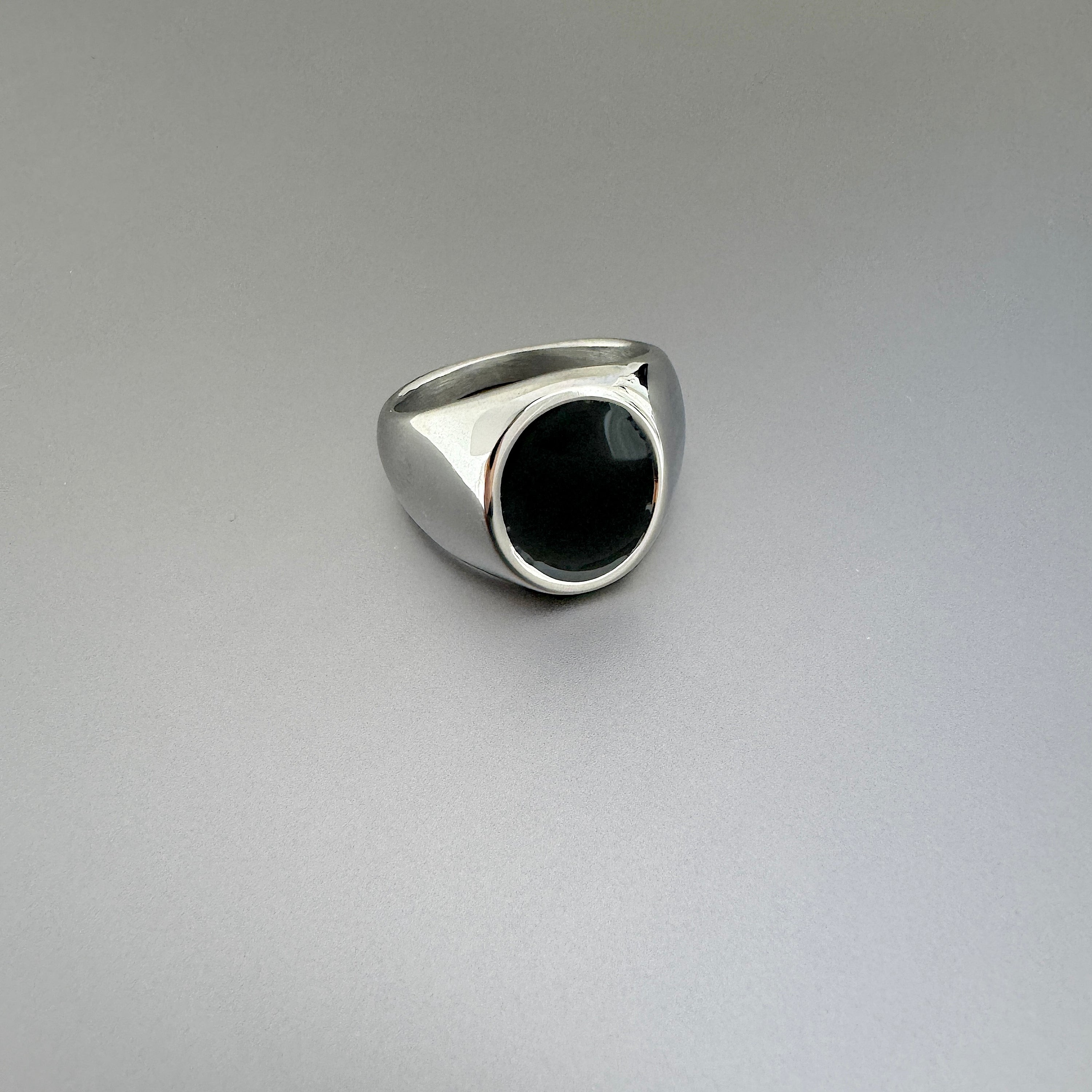 mens black oval pinky signet ring with polished silver stainless band