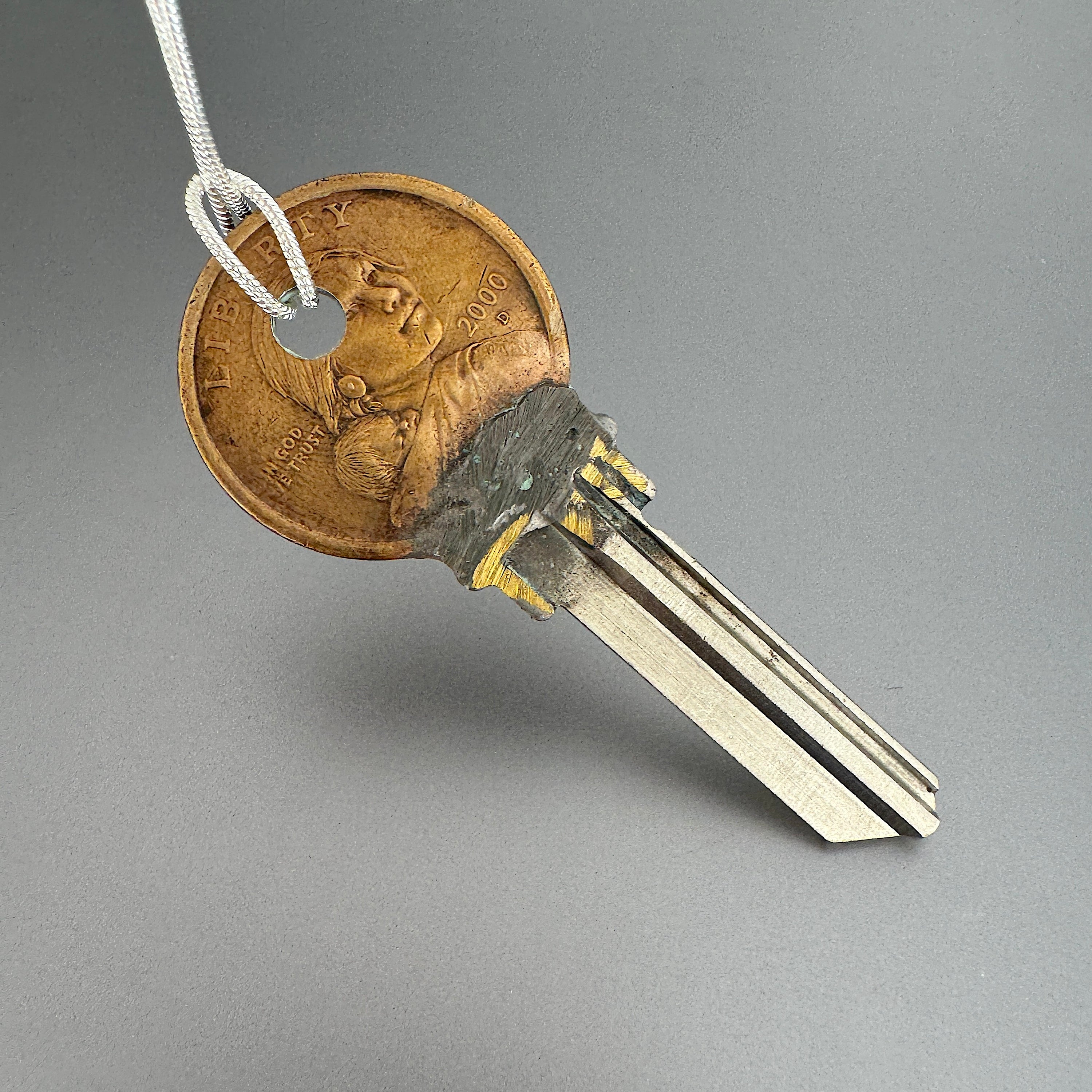 Dollar Coin Key Blade Pendant