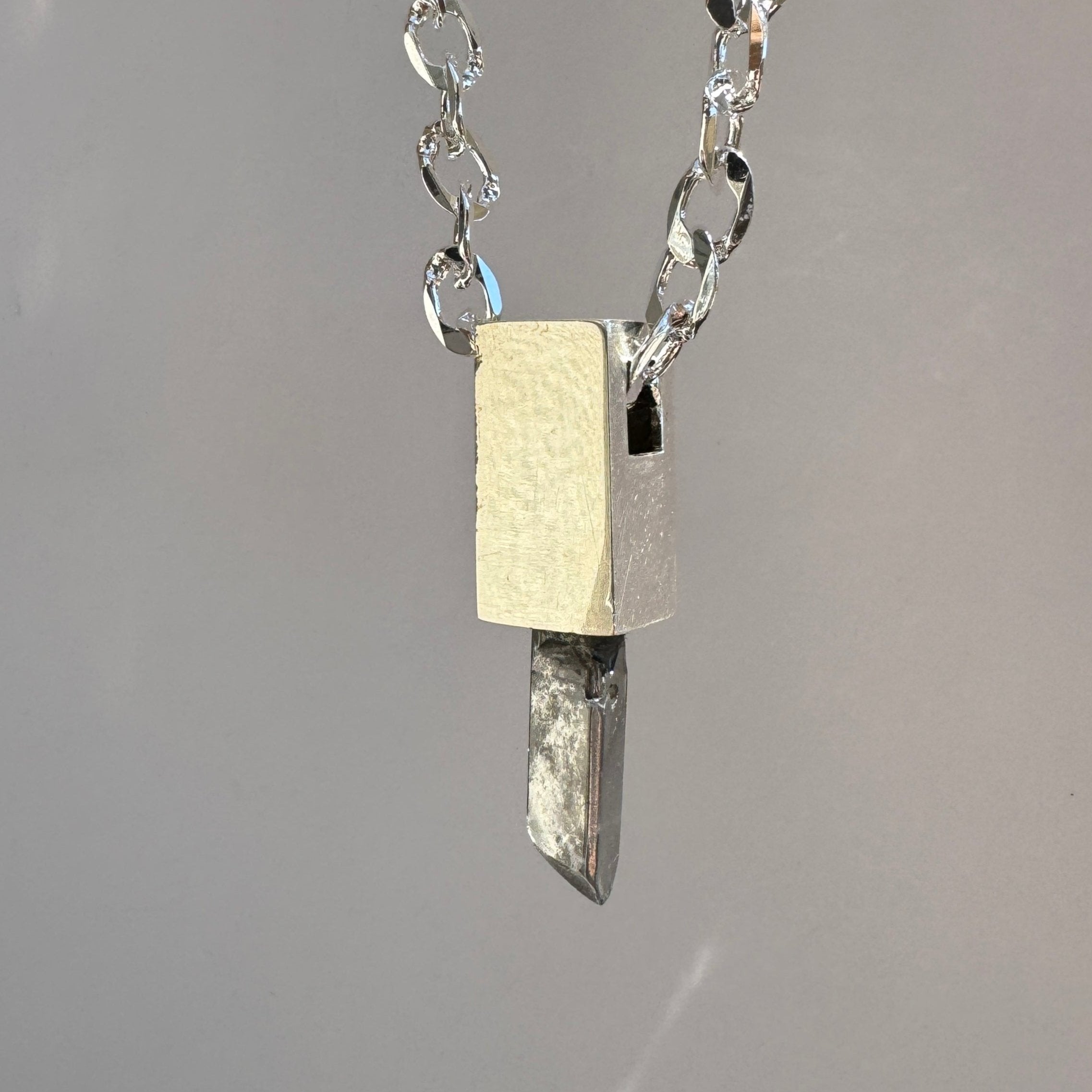 Raw Pyrite talisman necklace in polished sterling silver 